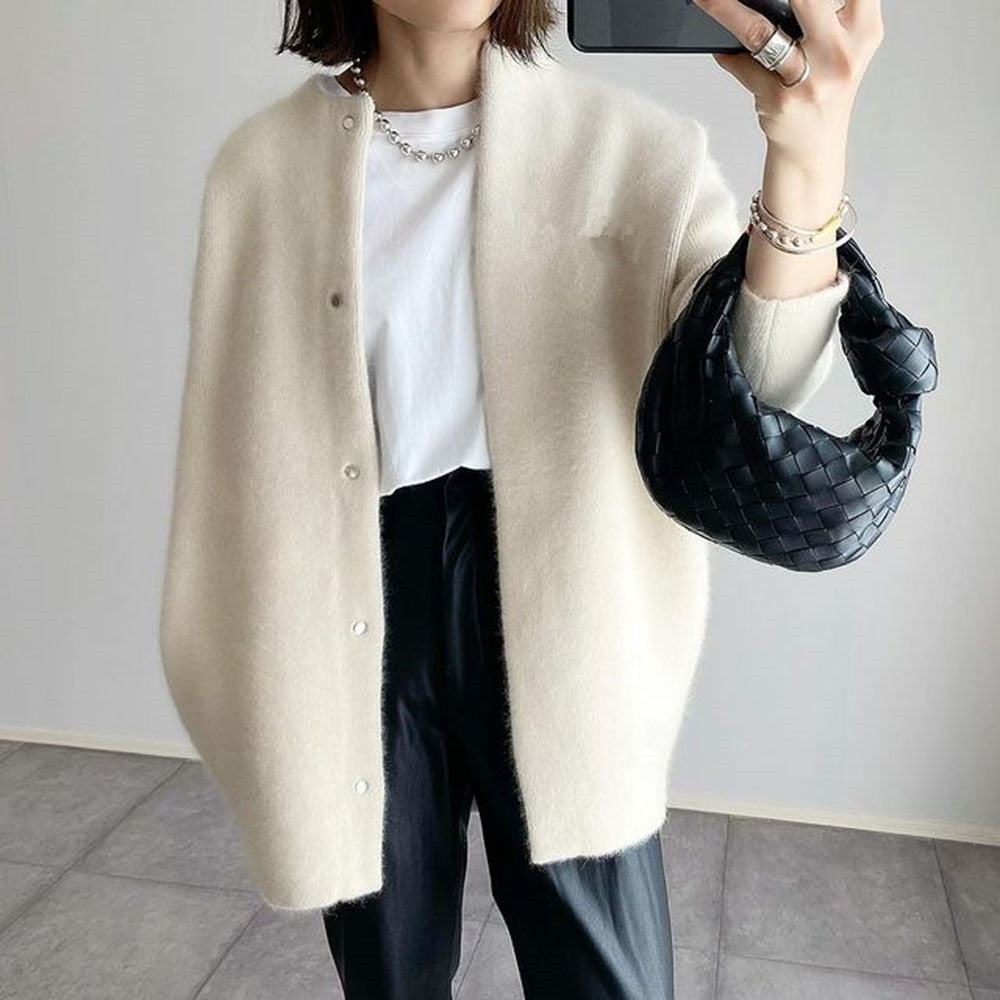 Women's longline button-front cardigan with round neckline and long sleeves