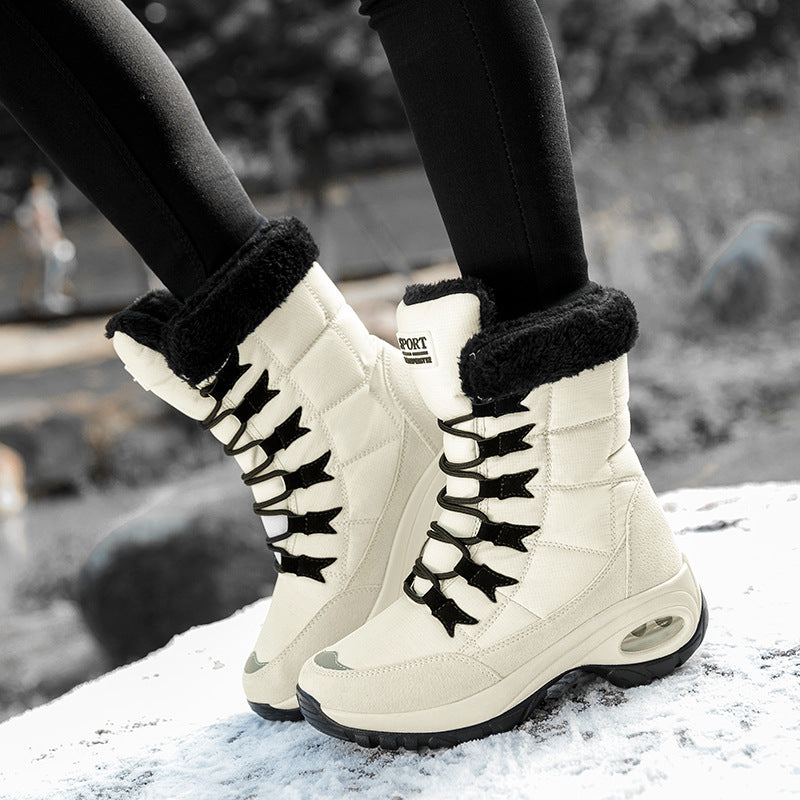 High-ankle lace-up winter boots with furry trim and lug soles