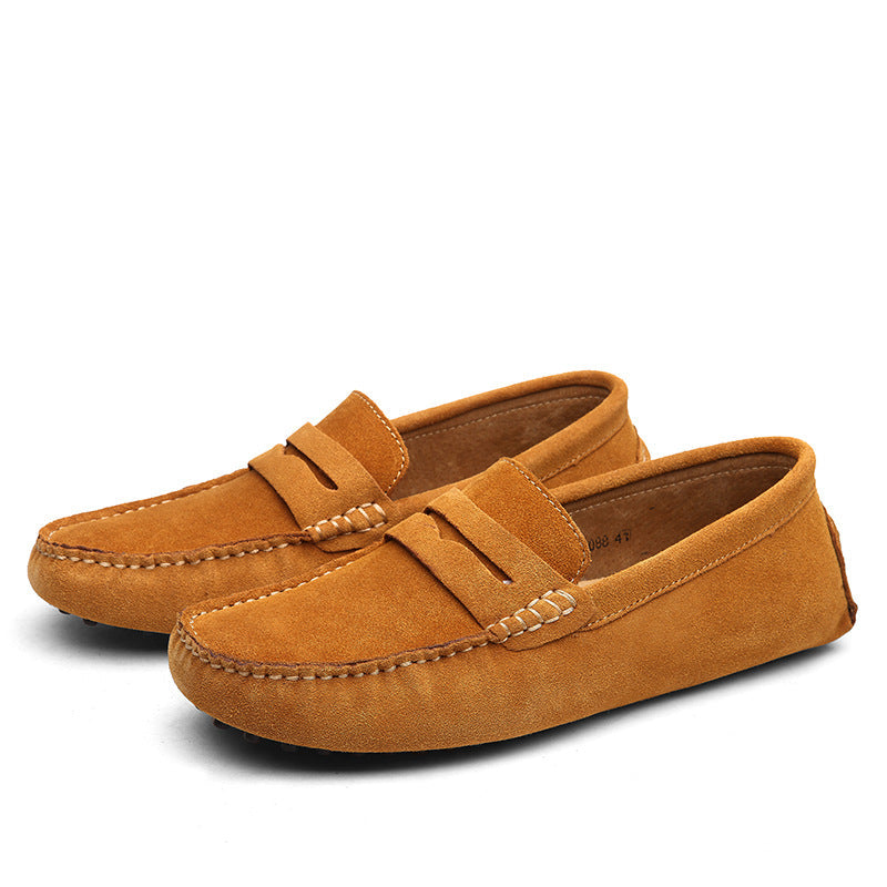 Men's slip-on loafers with moc toe stitching and penny strap detail