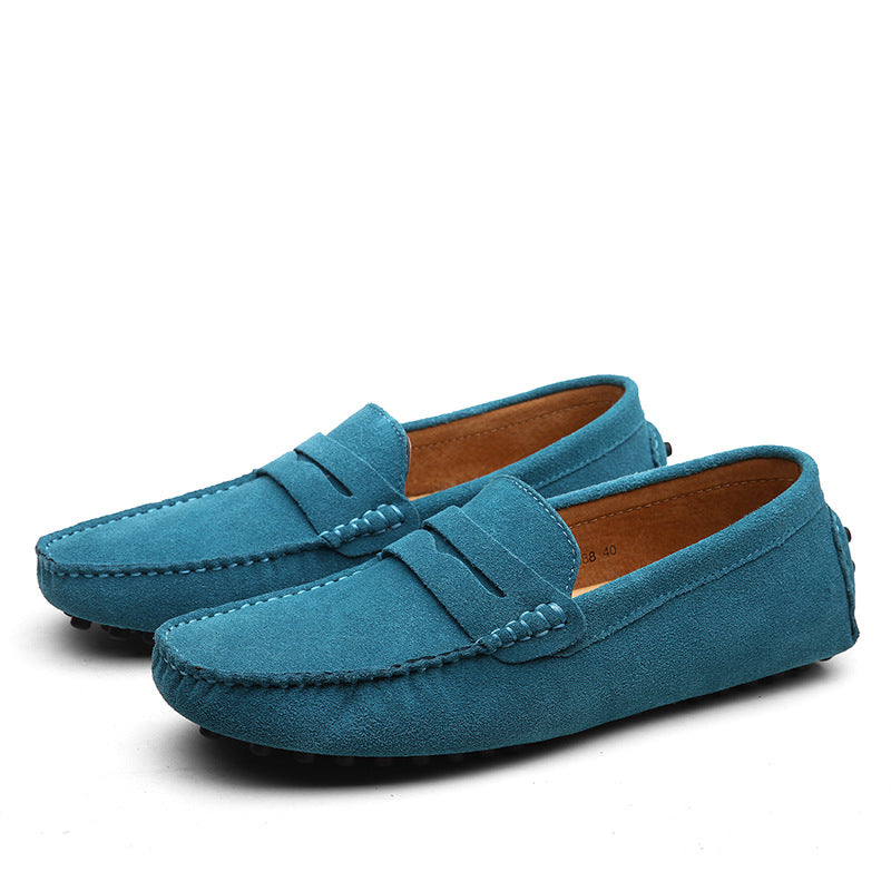 Men's slip-on loafers with moc toe stitching and penny strap detail