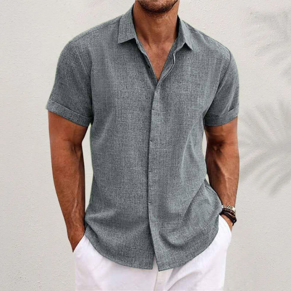 Men's short sleeve collared button shirt with open neckline and curved hem