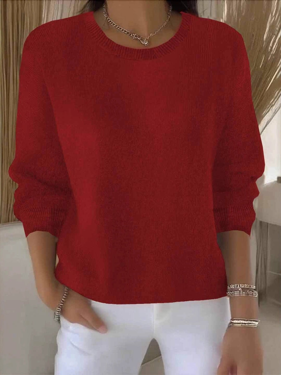 Women's crew neck knitted jumper with long sleeves and ribbed trims