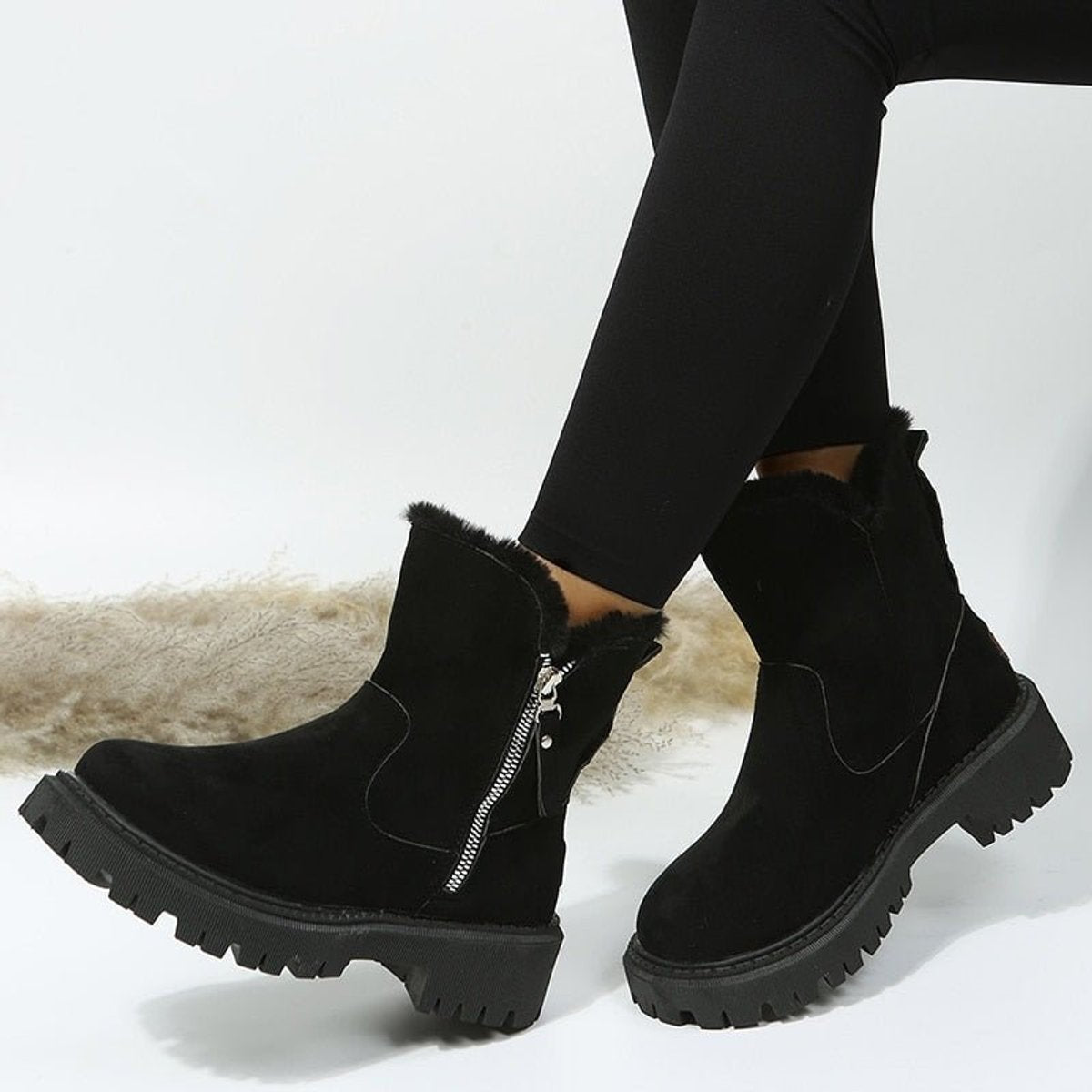 Women's fur-lined ankle boots with side zips and chunky lug soles