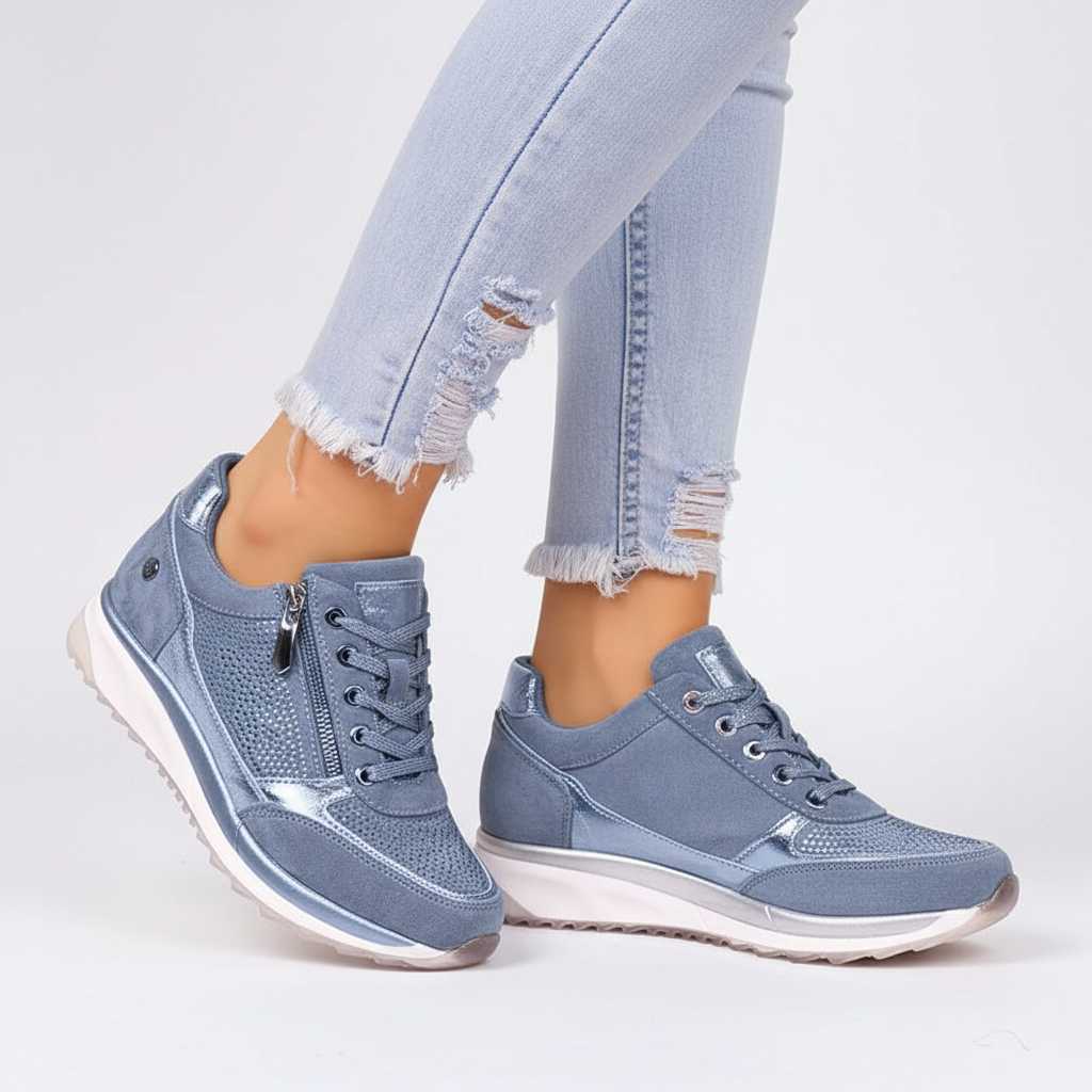 Women's low-top lace-up sneakers with metallic panel details and raised soles