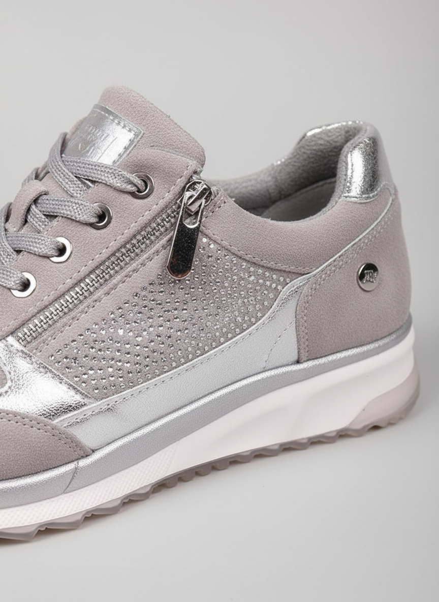Women's low-top lace-up sneakers with metallic panel details and raised soles