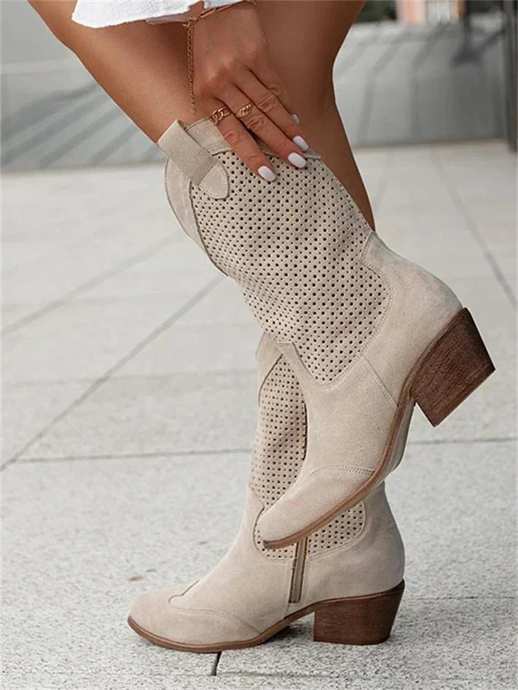 Women's perforated cowboy boots with pointed toes and mid stacked heels