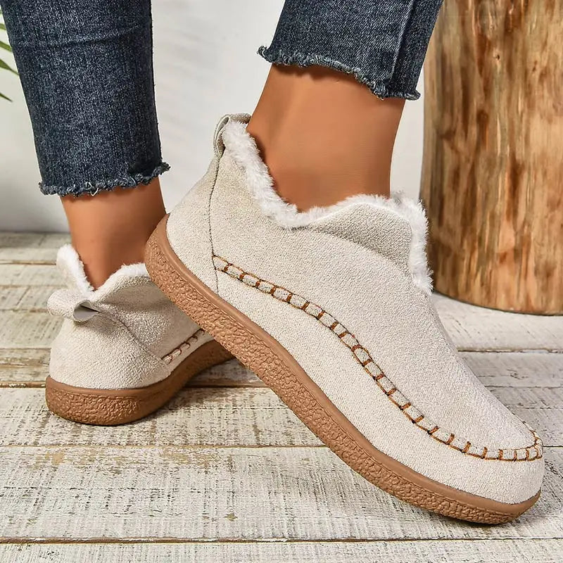 Women's fur-lined slip-on loafers with round toes and flat textured soles