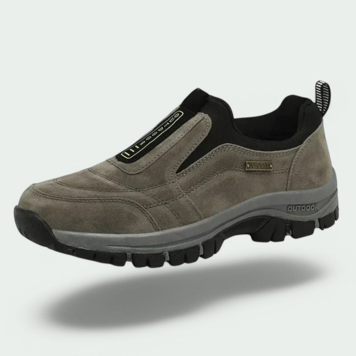 Slip-on walking shoe with stitched panels, contrast sole and deep tread