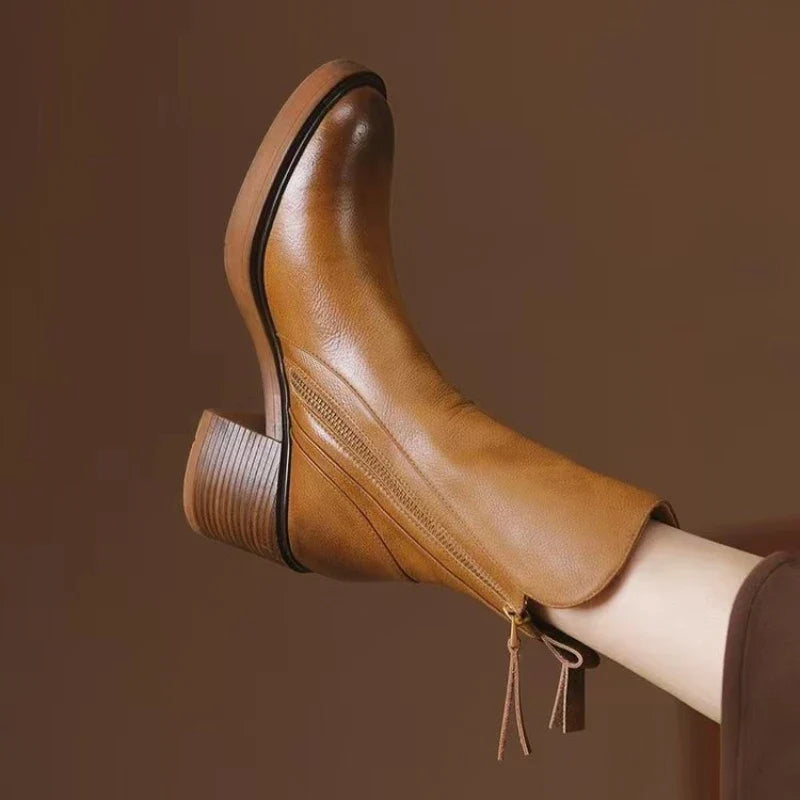 Women's ankle boots with side zips, almond toes and mid block heels