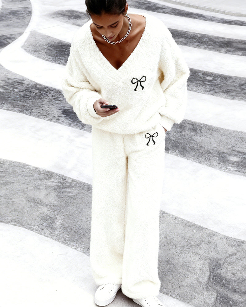 Women's textured two-piece set with bow embroidery, V-neck top and wide-leg trousers