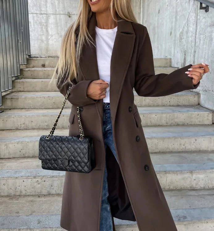 Women's longline belted double-breasted trench coat with lapel collar and long sleeves