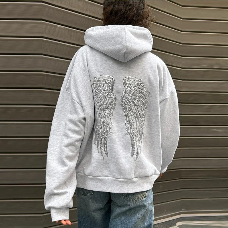Women's grey hoodie with sequin wing detail on the back