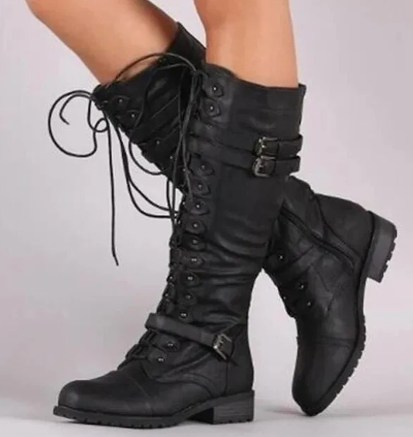 Women's tall lace-up biker boots with buckle straps and low block heels