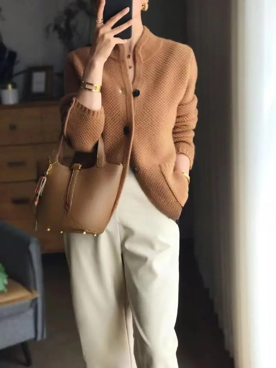 Women's textured knit jacket with stand collar, buttons and patch pockets