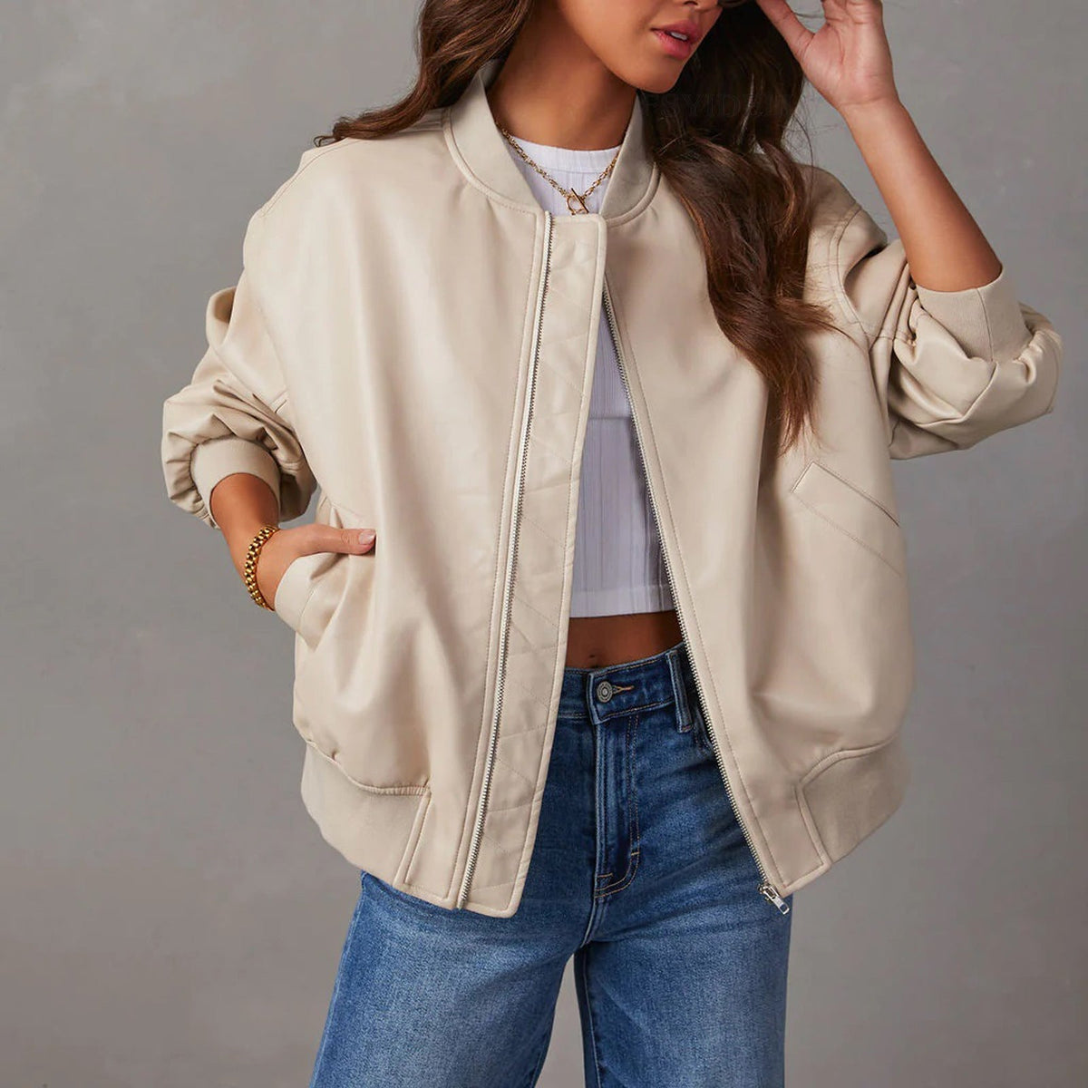 Women's bomber jacket with mock neck, zip front, ribbed trims and front pockets