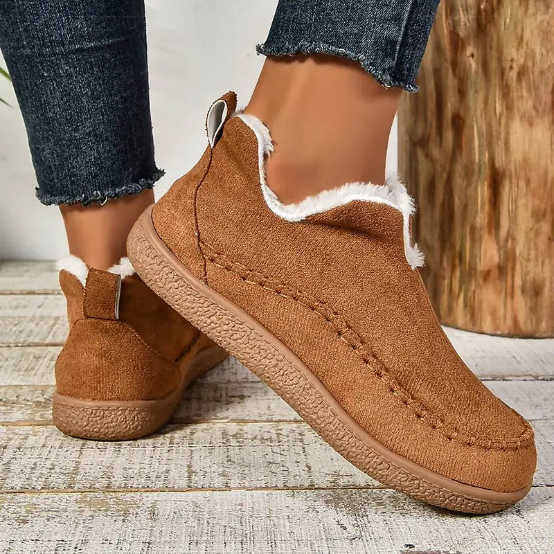 Women's fur-lined slip-on loafers with round toes and flat textured soles