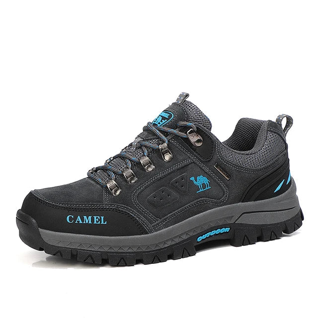 Low-cut lace-up hiking boots with round toes and treaded soles