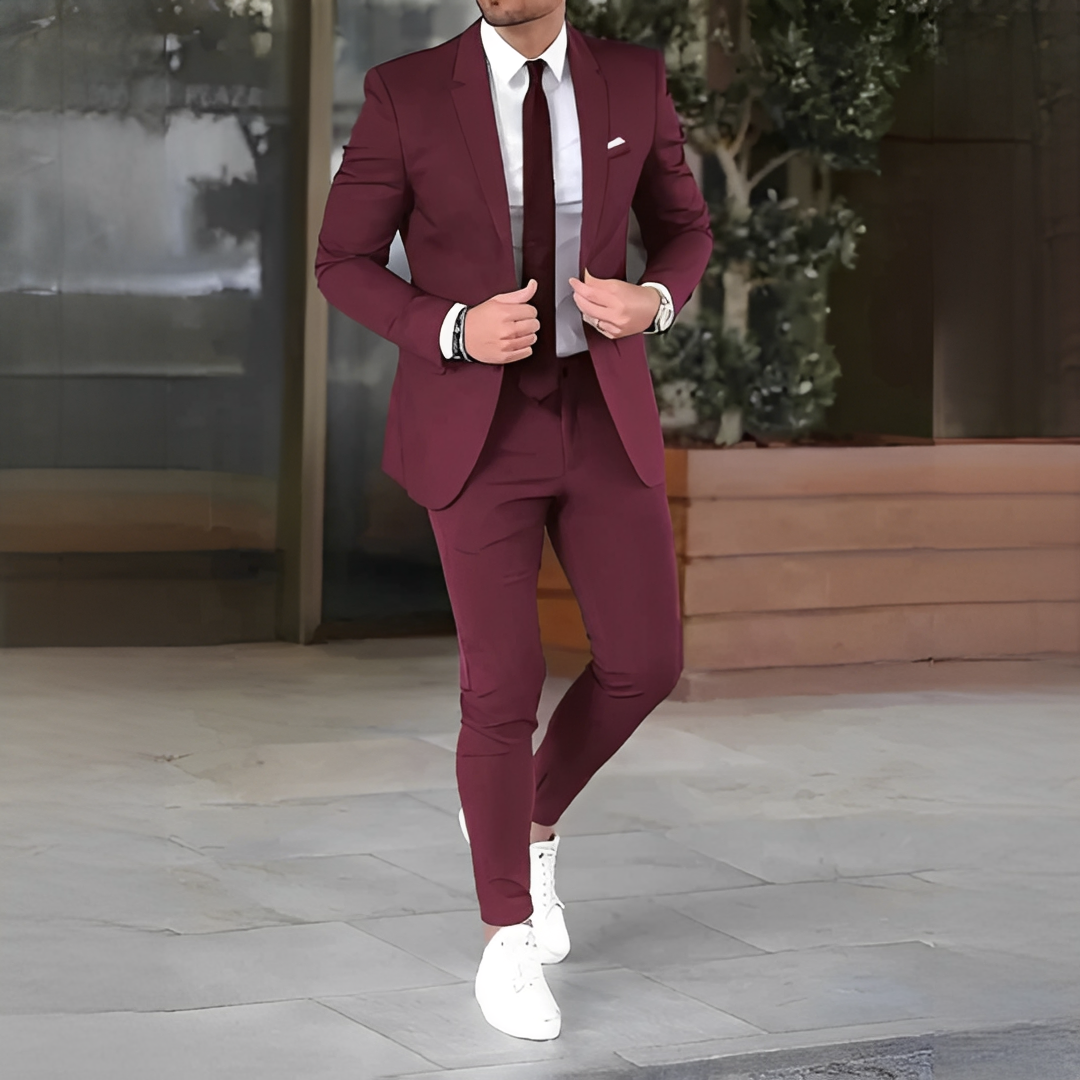Men's two-piece suit with notch-lapel blazer, tie and matching trousers