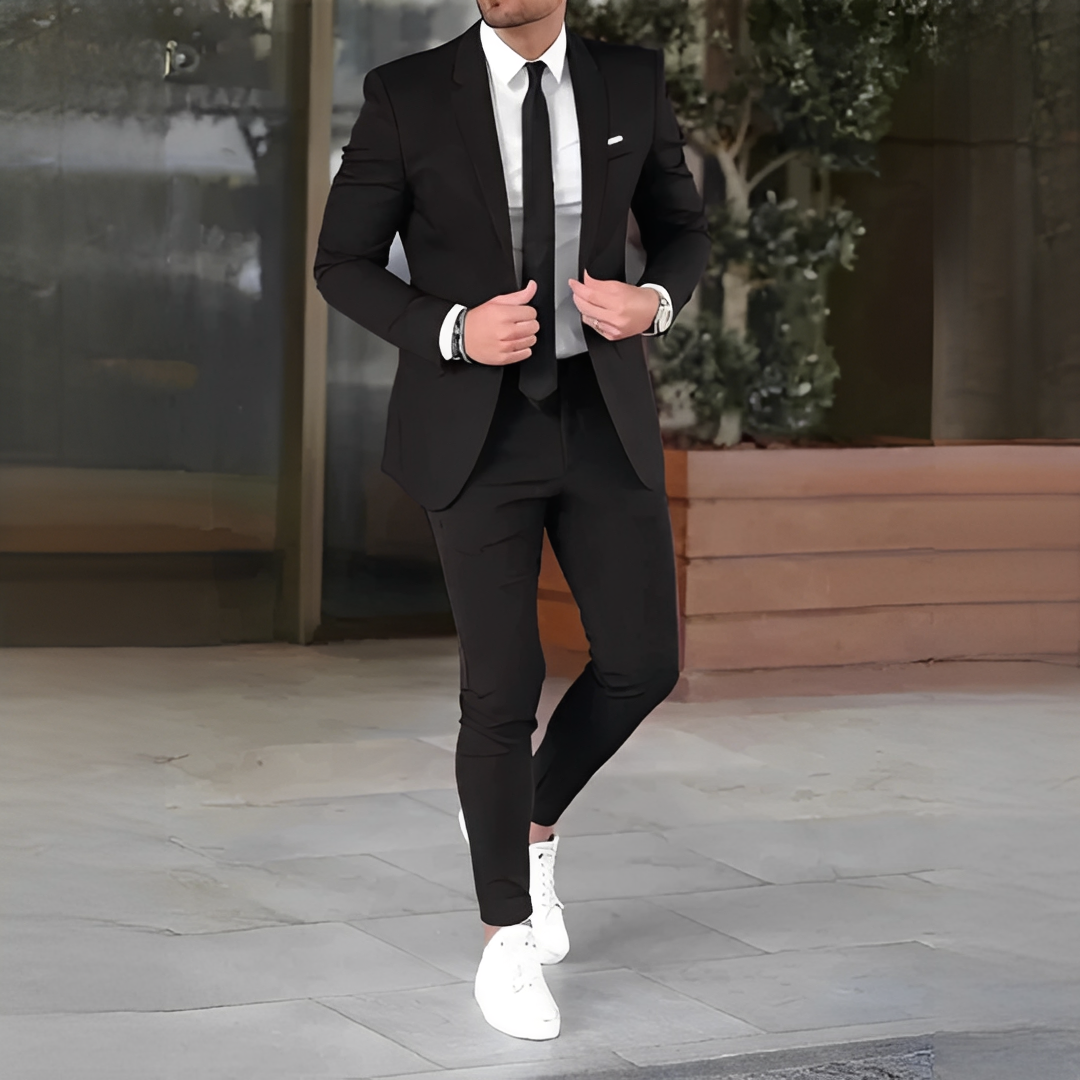 Men's two-piece suit with notch-lapel blazer, tie and matching trousers