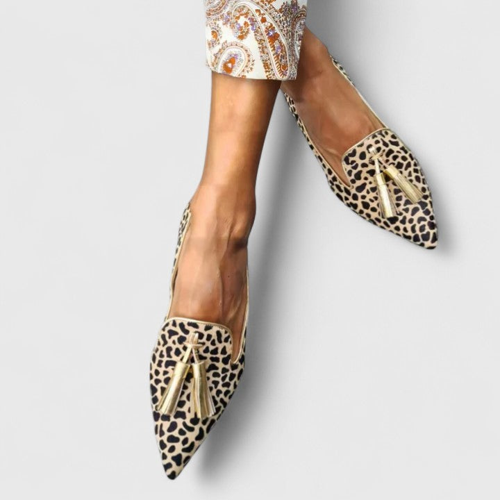 Women's pointed leopard print loafers with tassel trim