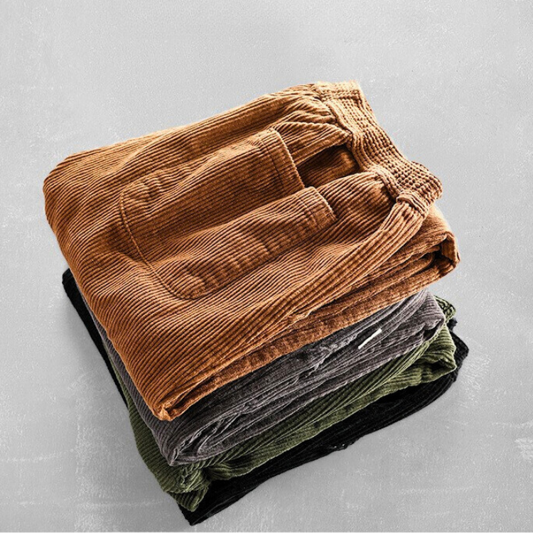 Men's tapered corduroy trousers with elasticated waist and turned-up cuffs