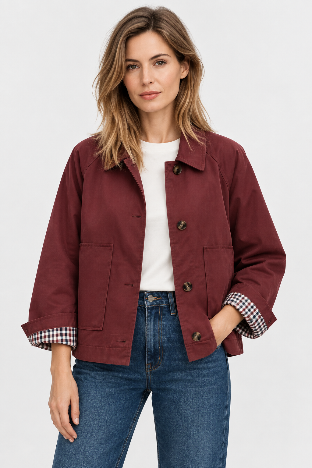 Women's short trench jacket with button front, patch pockets and checked cuff lining
