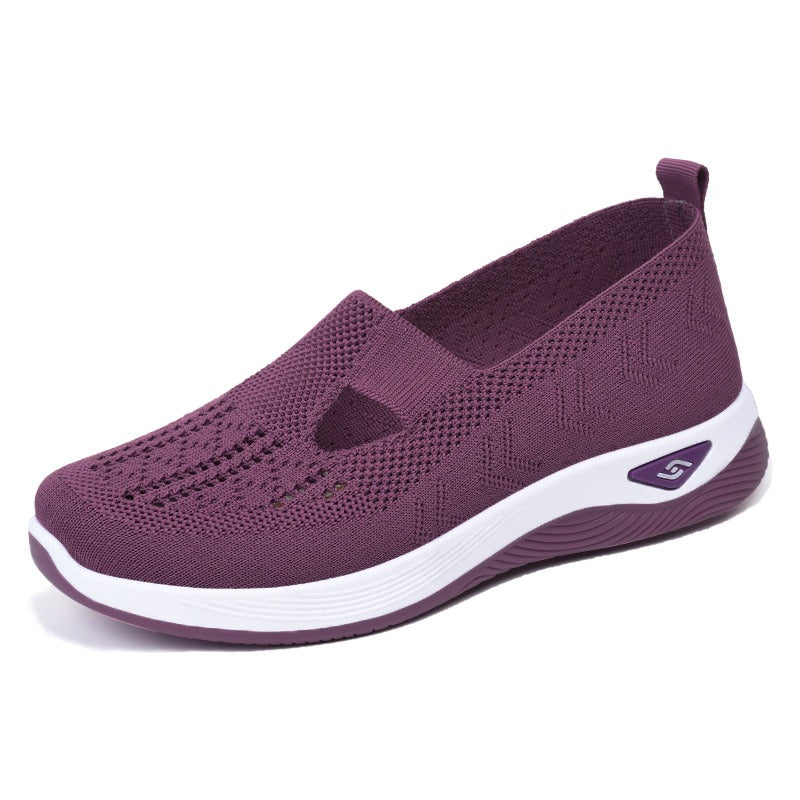 Women's slip-on knit-style trainers with a rounded toe and raised white sole