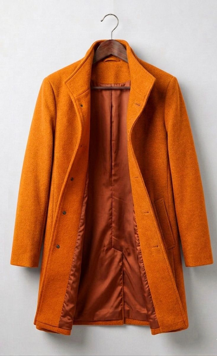 Women's long button front coat with notched lapels and angled pockets