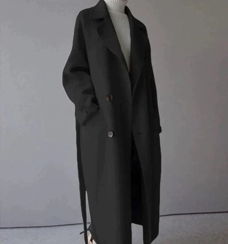 Women's long plain tailored coat with lapel collar and button front