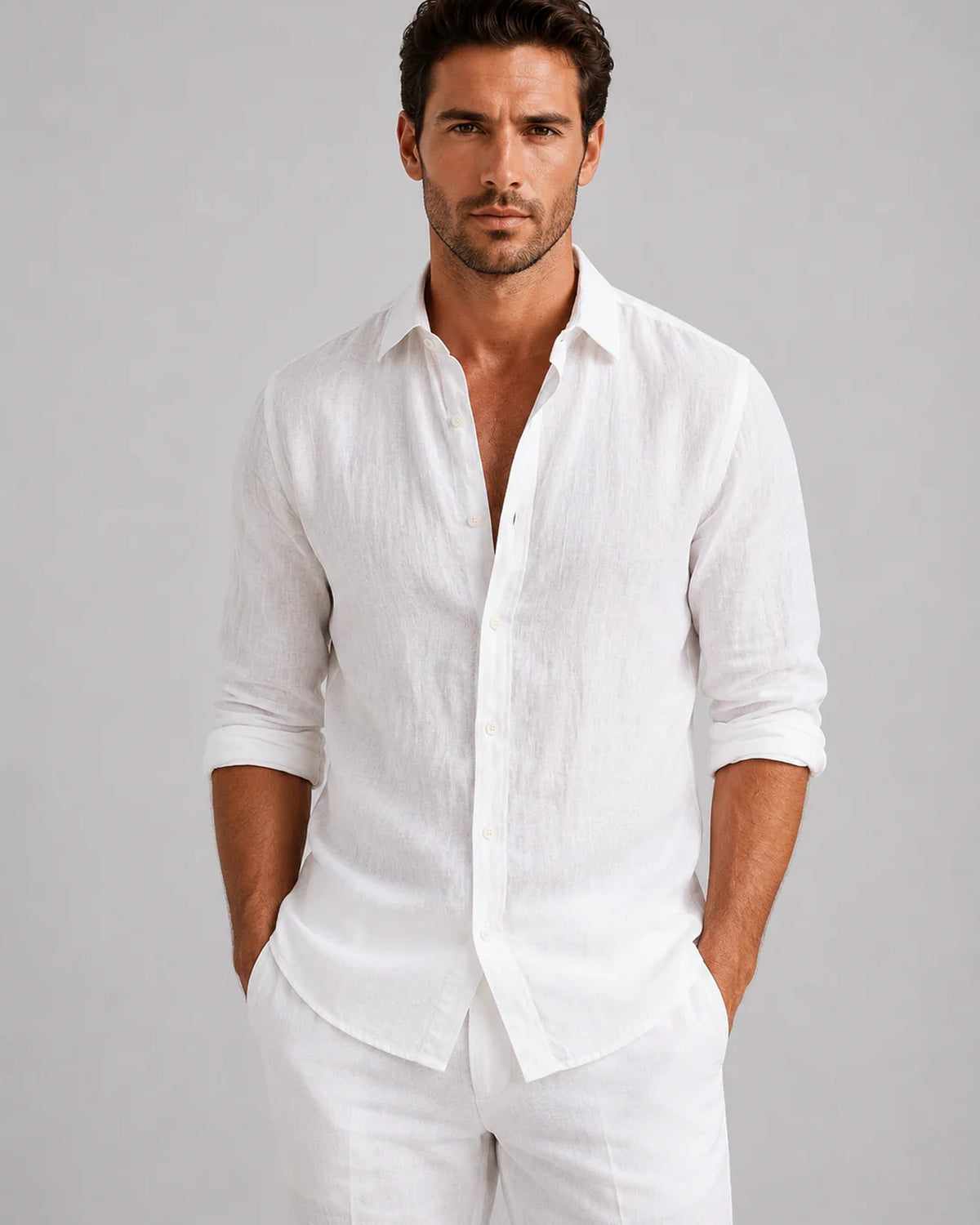 Men's long-sleeve textured button-up shirt with spread collar and curved hem