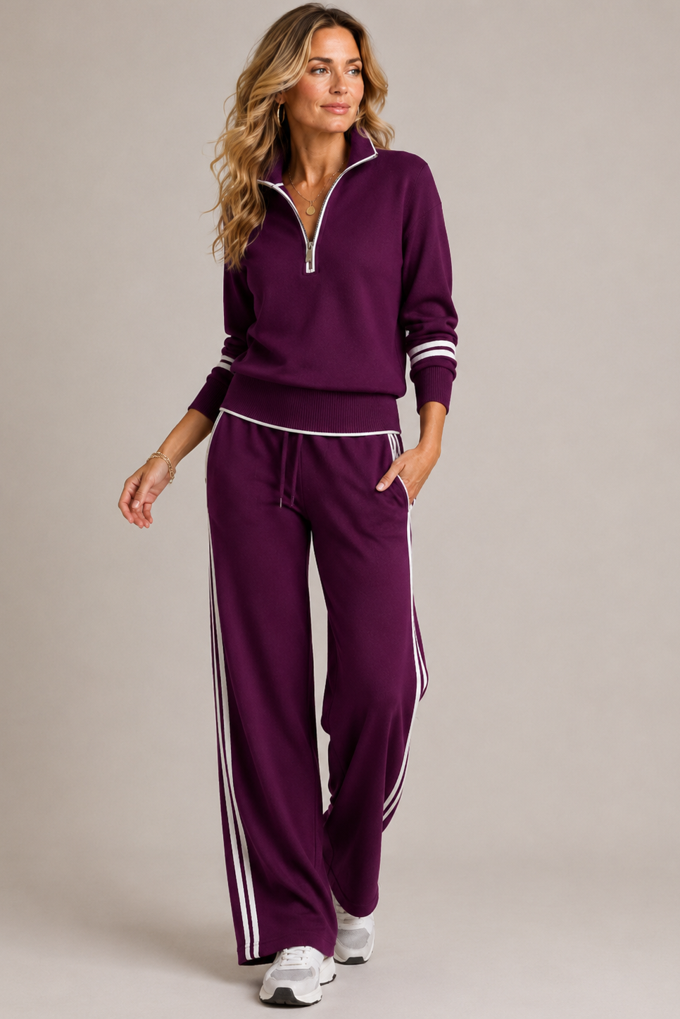 Women's mock-neck zip sweater and wide-leg trouser set with contrast stripes