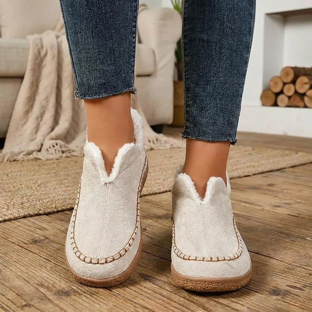 Women's fur-lined slip-on loafers with round toes and flat textured soles