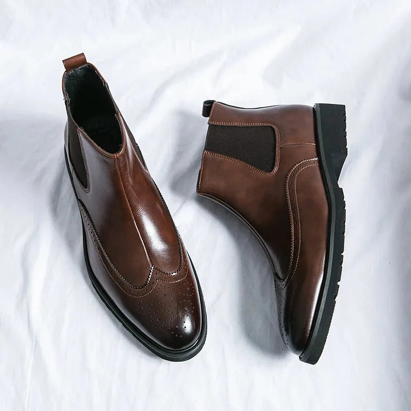 Chelsea boots with brogue detailing, elastic side panels and lug soles