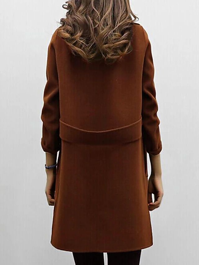 Women's long double-breasted coat with wide lapels and long sleeves