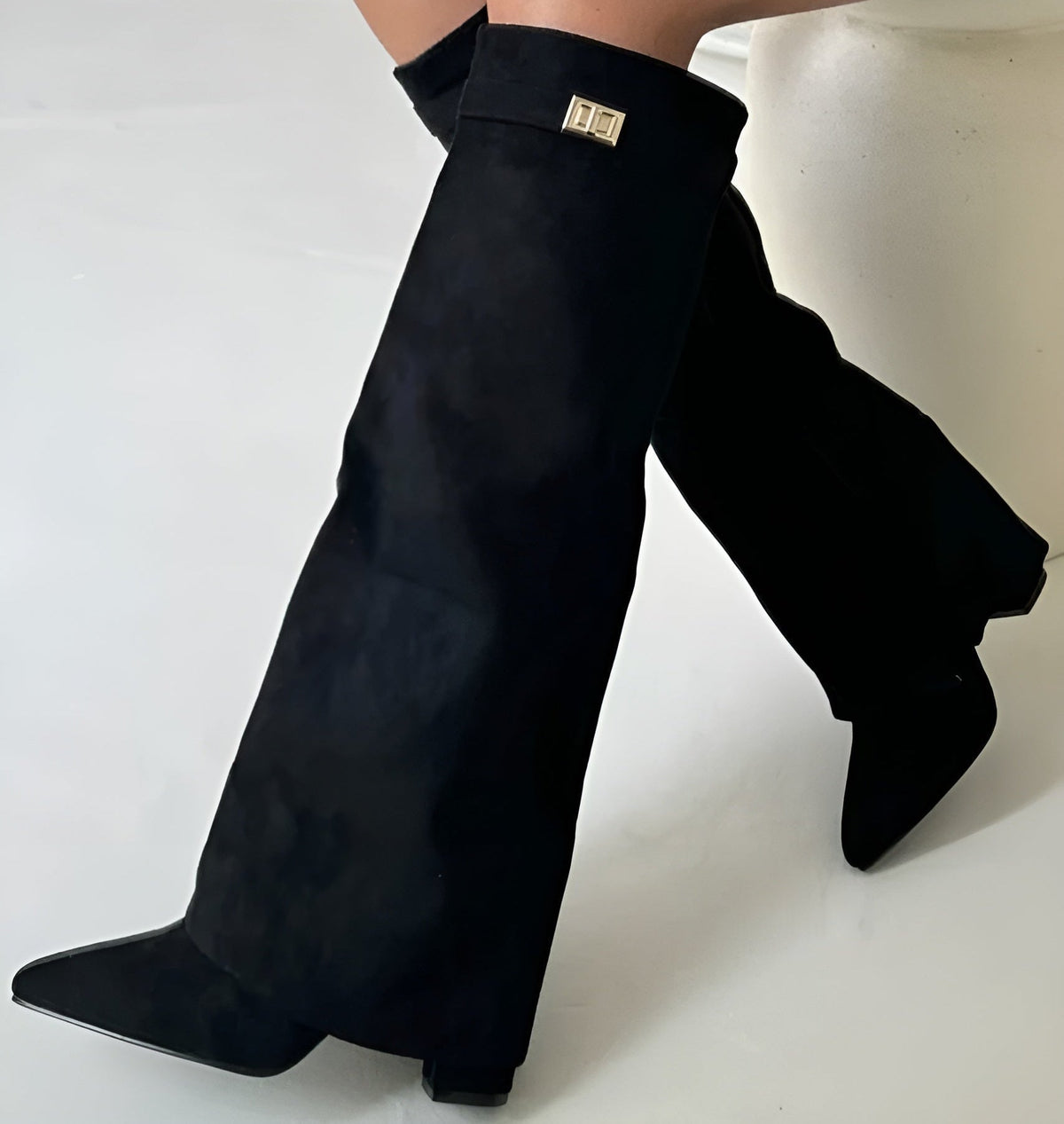 Women's knee-high pointed-toe boots with block heels and buckle details