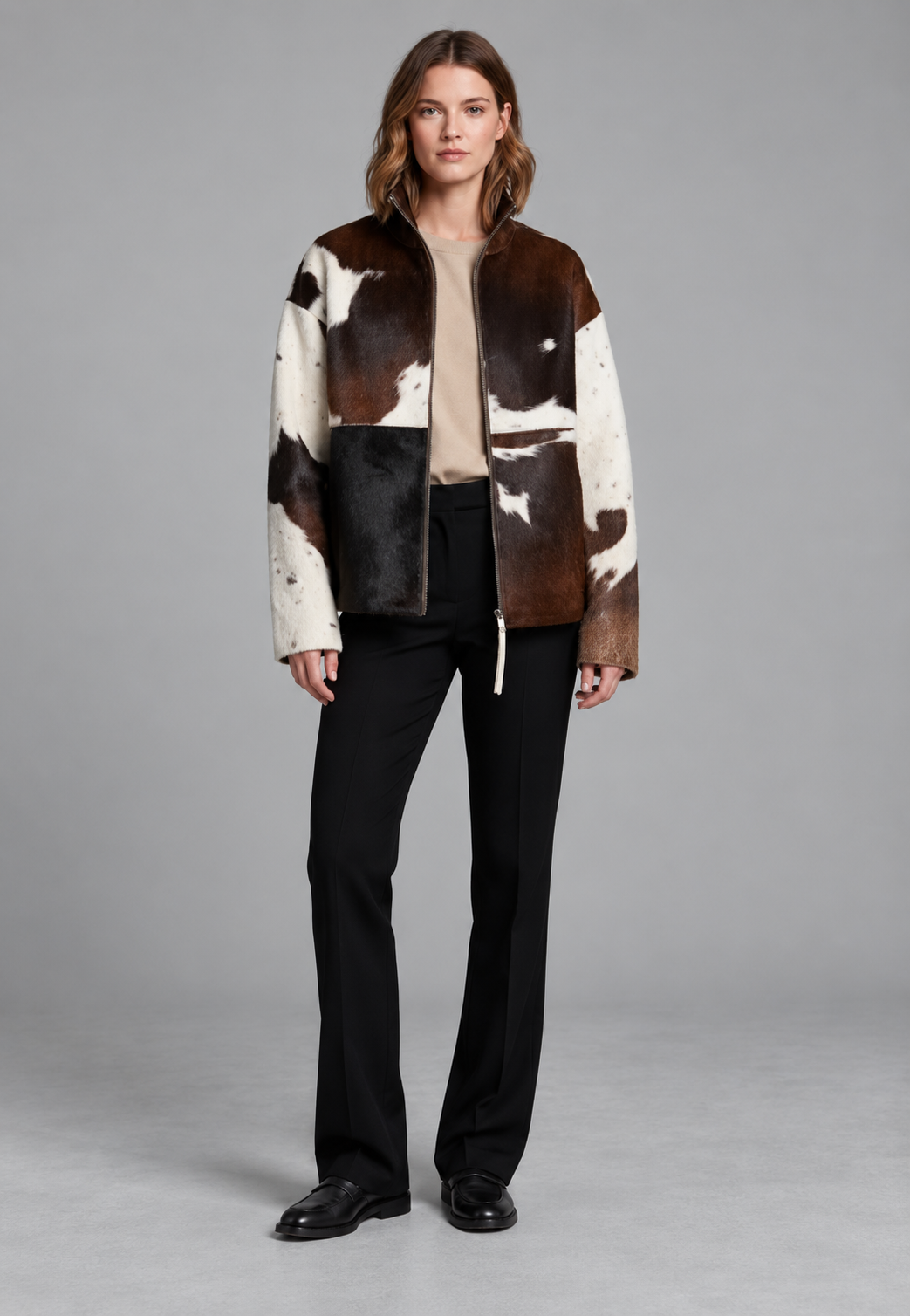 Women's brown, black and cream cow print faux fur jacket with stand collar