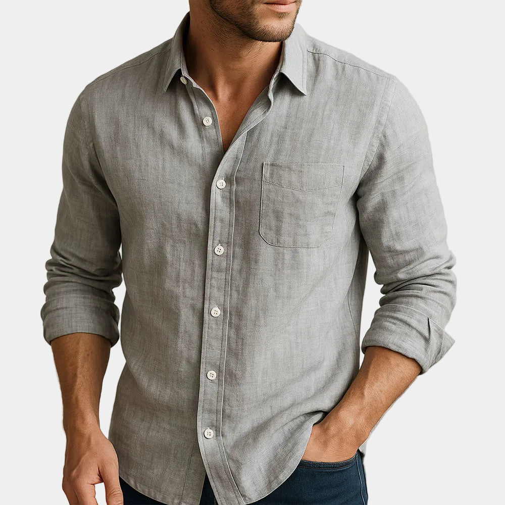Men's long-sleeve button-up shirt with pointed collar and curved hem