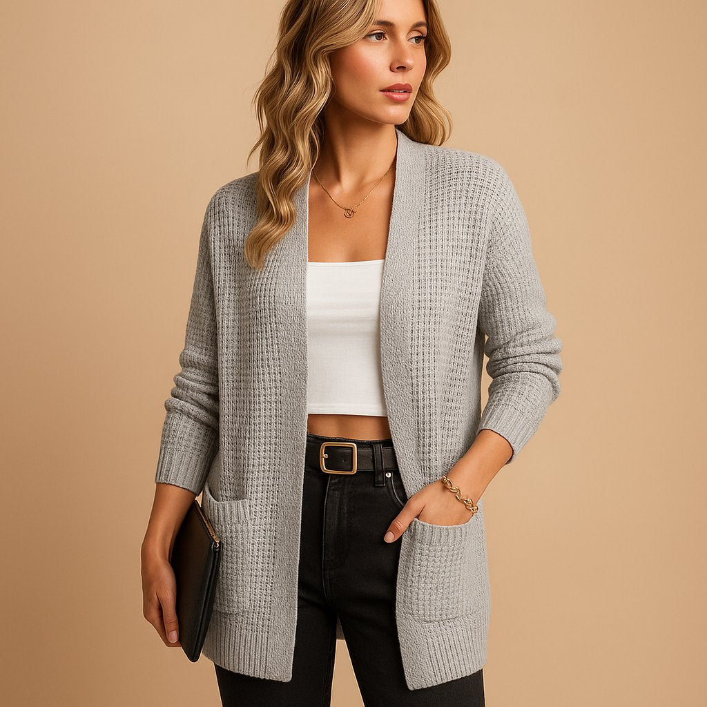 Women's long ribbed cardigan with open front, long sleeves and front patch pockets