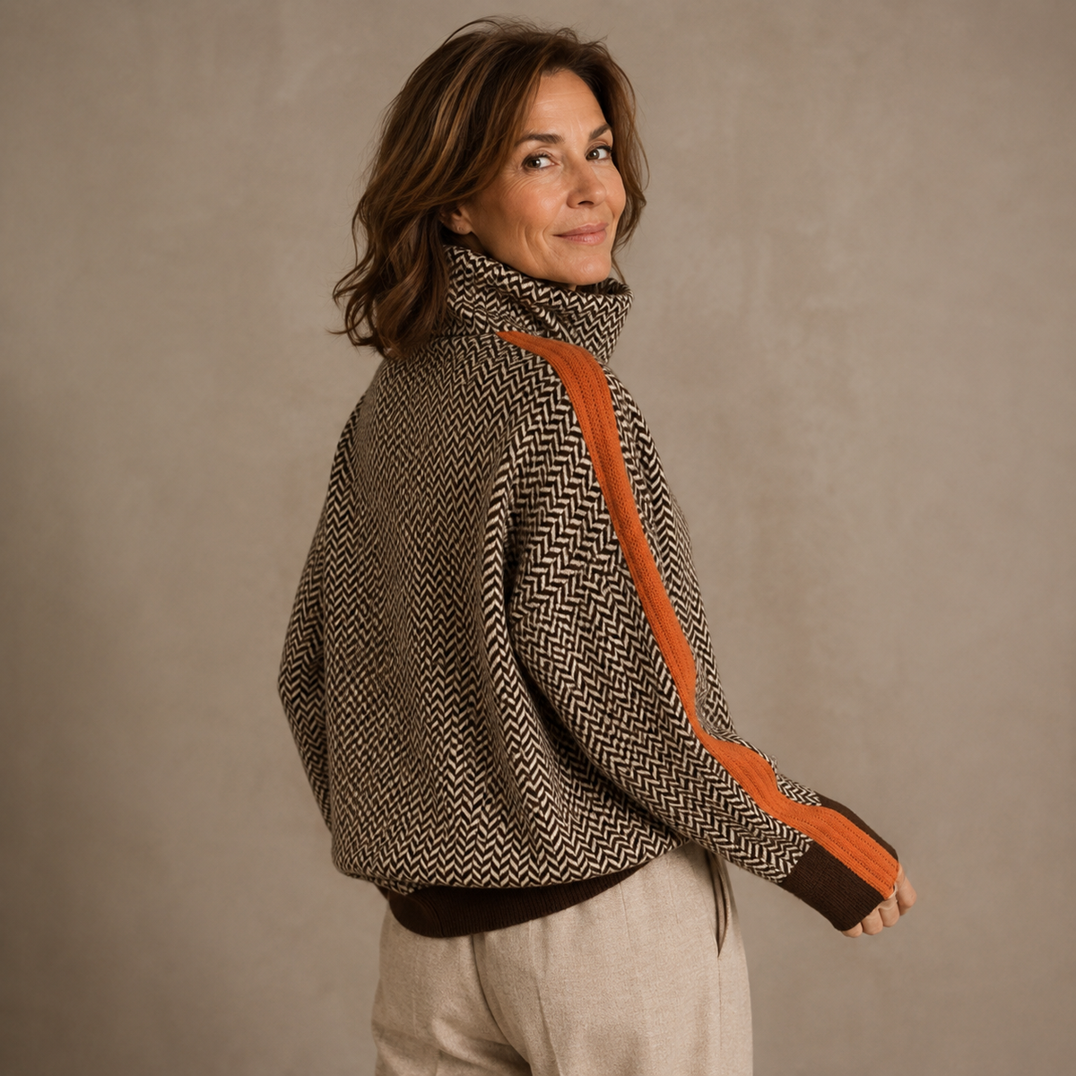 Women's herringbone turtleneck sweater with contrast sleeve trim