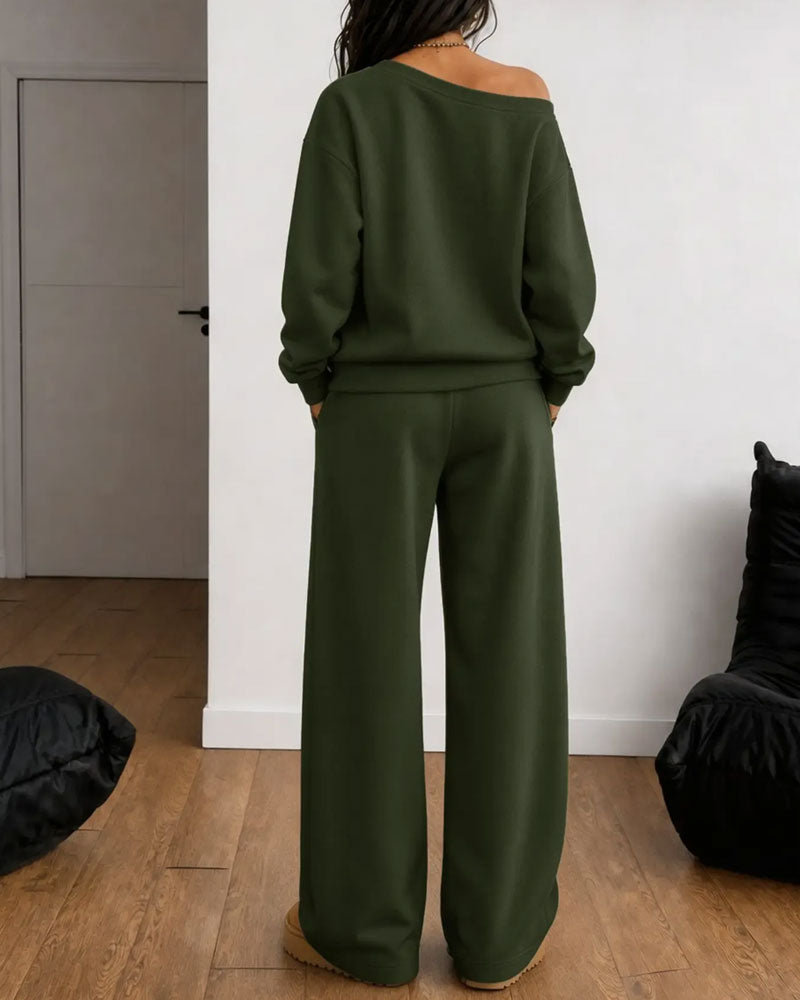 Women's asymmetric sweatshirt and wide-leg trousers set shown in white and black