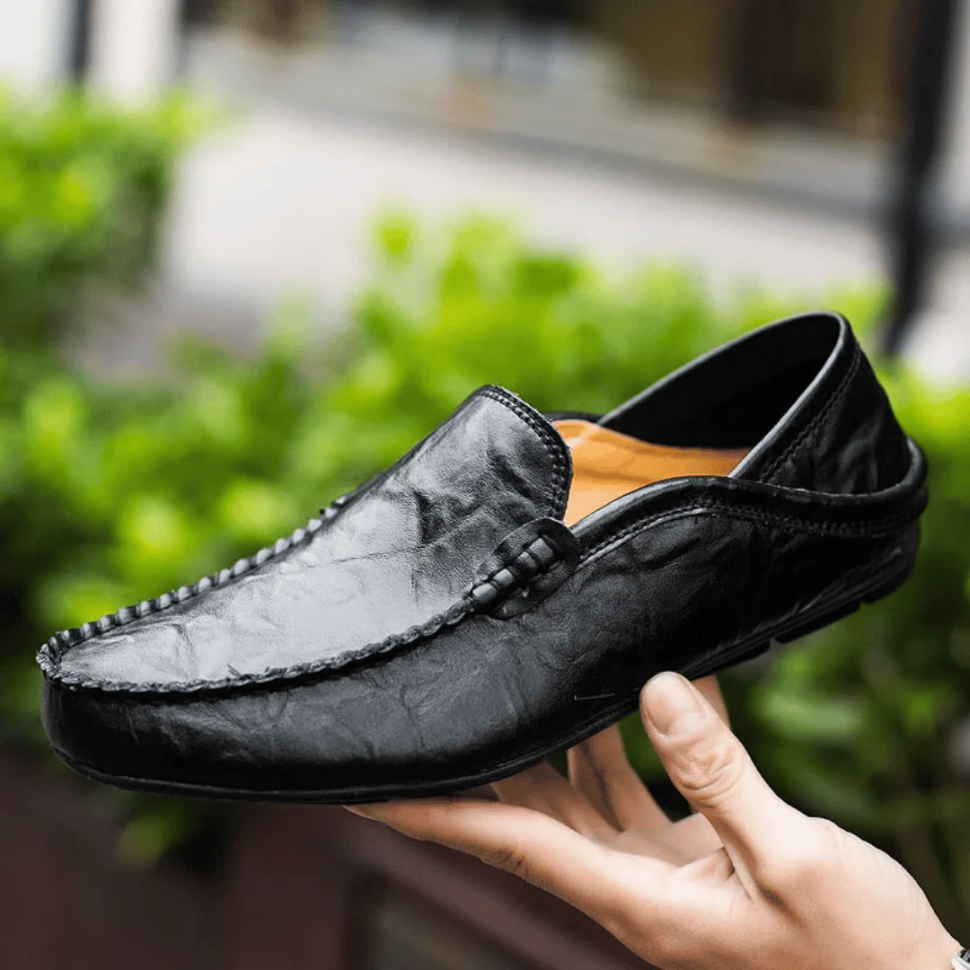 Men's slip-on loafer with stitched moc toe and decorative vamp trim