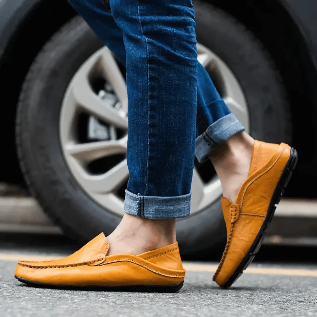 Men's slip-on loafer with stitched moc toe and decorative vamp trim