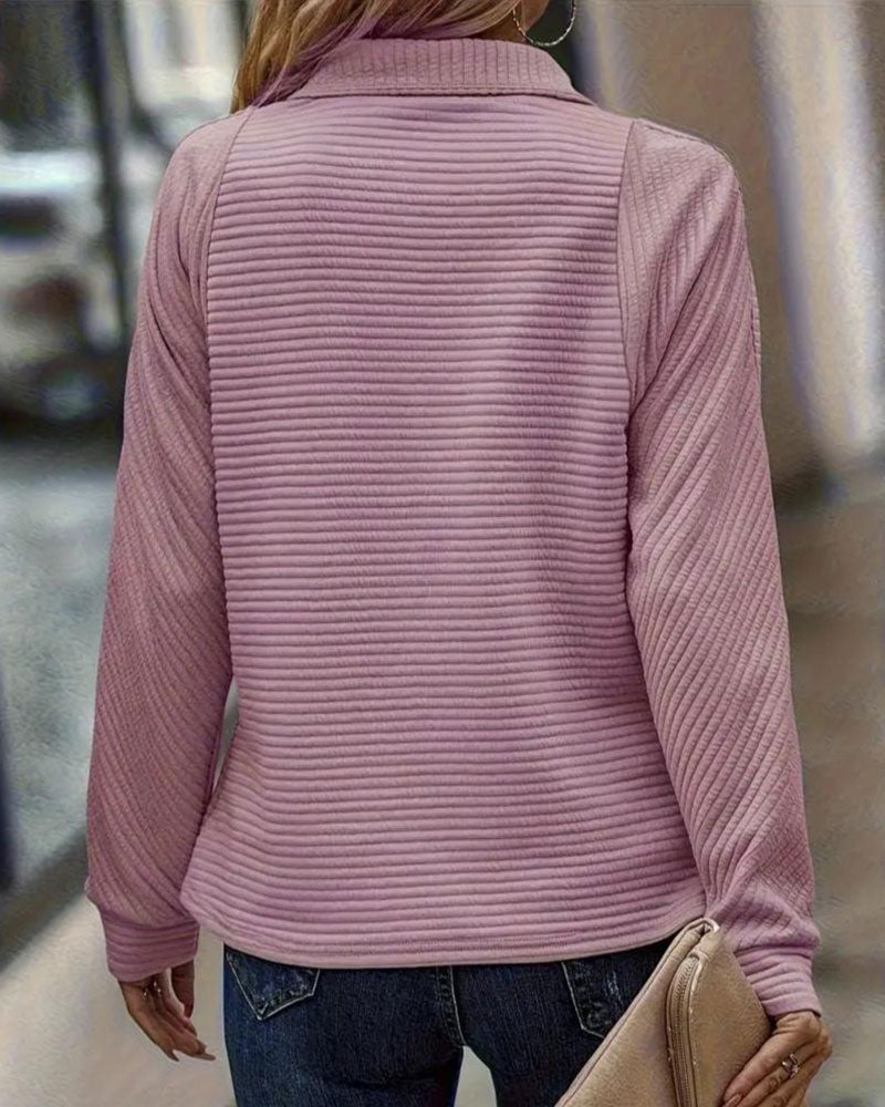 Women's ribbed quarter-zip sweatshirt with a high stand collar and long sleeves
