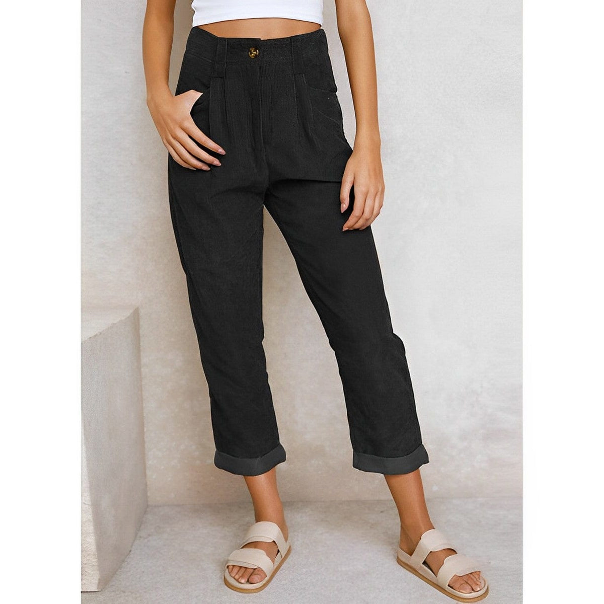 Women's high-rise corduroy trousers with straight legs, side pockets and cuffed hems