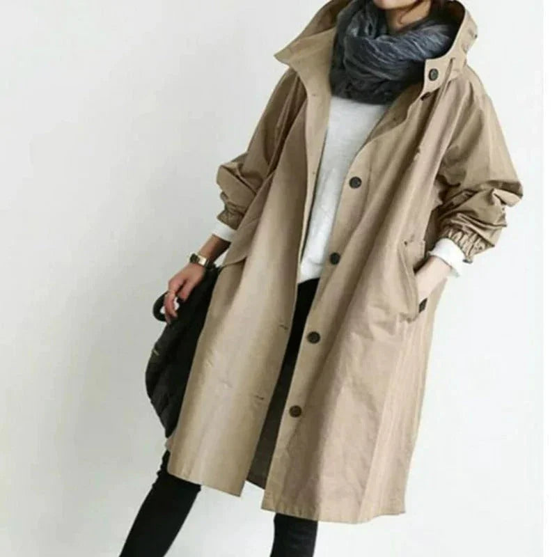 Women's long hooded trench coat with button front and side pockets