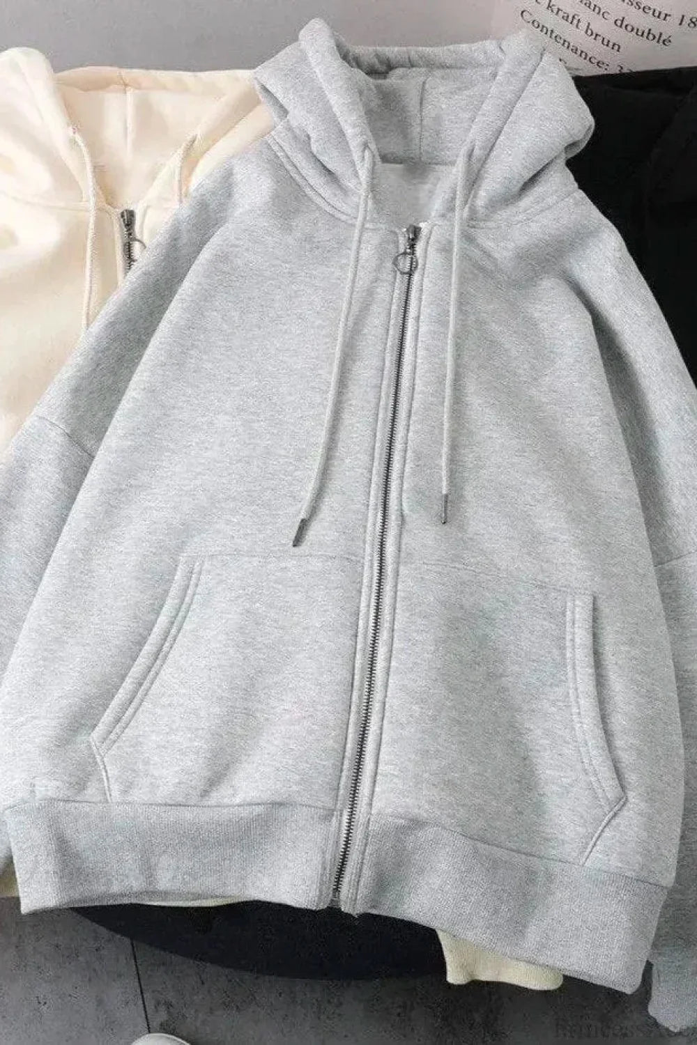 Graphic zip-up hoodie with hood, long sleeves and front pockets