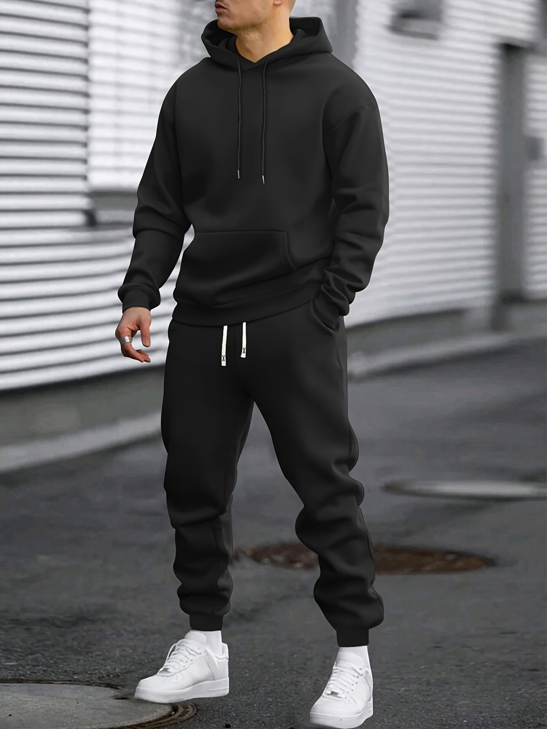 Men's hooded hoodie and jogger trousers set with drawstring details and tapered legs