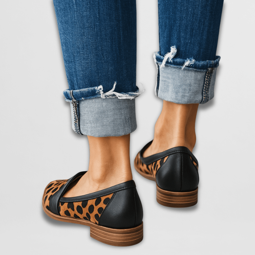 Women's pointed toe penny loafers with textured uppers and low heels