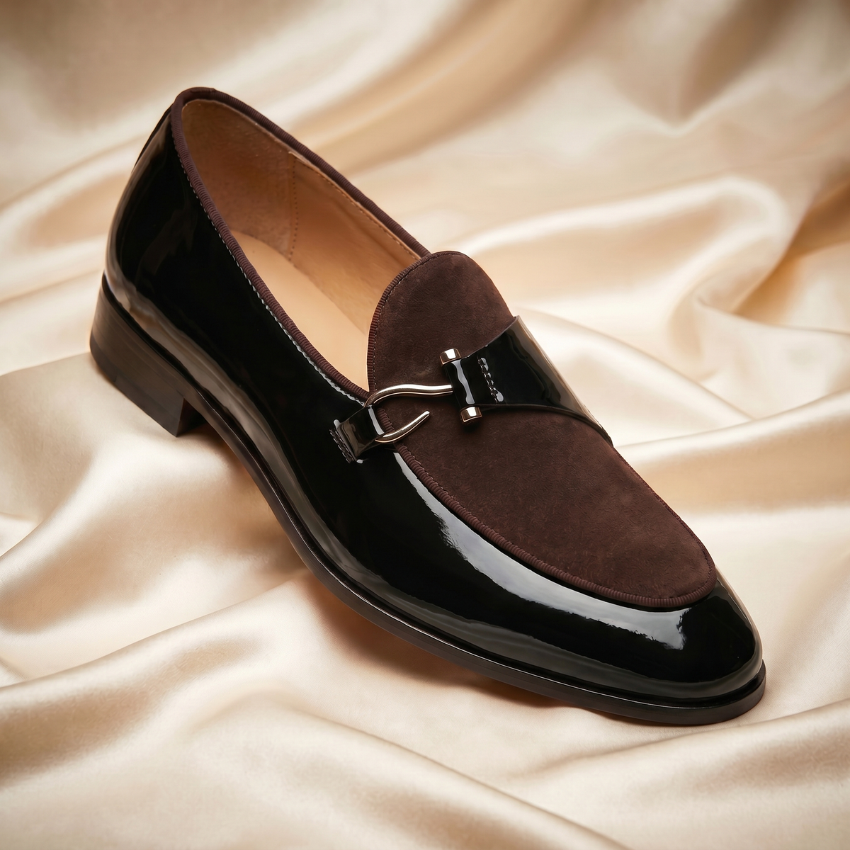 Men's slip-on loafers with almond toe, glossy finish and buckle trim