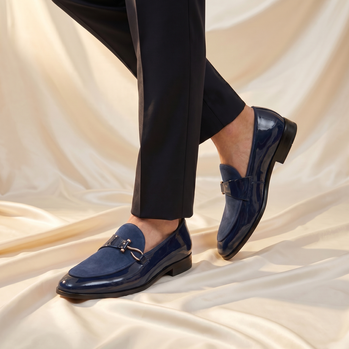 Men's slip-on loafers with almond toe, glossy finish and buckle trim